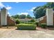 Inviting exterior view showcasing the home's brick accents and well-manicured landscaping at 6016 Farm Gate Rd, Raleigh, NC 27606