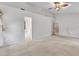 Carpeted bedroom featuring large windows and easy access to the en-suite bath at 605 Catlin Rd, Cary, NC 27519