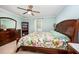 This bedroom features a bed and dresser at 609 N Country Club Dr, Oxford, NC 27565