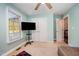 This bedroom has minimal furnishings and lots of sunlight at 609 N Country Club Dr, Oxford, NC 27565