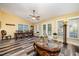Dining and living room space with neutral paint and flooring at 609 N Country Club Dr, Oxford, NC 27565