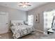Bedroom featuring a comfortable bed, modern decor, and natural light at 6612 Enrichment Ln, Raleigh, NC 27616