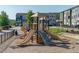 Community playground featuring multiple slides and climbing structures for active fun at 6612 Enrichment Ln, Raleigh, NC 27616