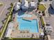 Stunning aerial view of the community pool, showcasing its size and surrounding amenities at 6612 Enrichment Ln, Raleigh, NC 27616