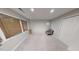Well-lit bedroom with neutral walls, light carpet, and closet space at 71010 Russell, Chapel Hill, NC 27517
