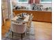 Dining area featuring modern decor, lots of natural light, and warm hardwood floors at 71010 Russell, Chapel Hill, NC 27517