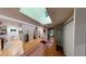Inviting foyer with tile floors, a skylight, and easy access to multiple living spaces at 71010 Russell, Chapel Hill, NC 27517