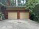 Spacious two-car garage featuring new doors and freshly painted trim at 71010 Russell, Chapel Hill, NC 27517
