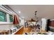 Open-concept kitchen and dining area with hardwood floors and a bar with seating at 71010 Russell, Chapel Hill, NC 27517