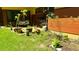 Green yard featuring an assortment of potted plants and beautiful landscaping at 71010 Russell, Chapel Hill, NC 27517