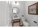 Stylish powder room featuring modern fixtures, floating vanity, and contemporary design at 807 Edmund St, Raleigh, NC 27604