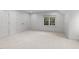 Spacious bedroom featuring neutral carpeting, ample natural light, and closet and storage space at 807 Edmund St, Raleigh, NC 27604