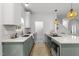 Well-equipped kitchen with modern appliances, stylish countertops, and ample cabinet space at 807 Edmund St, Raleigh, NC 27604