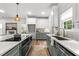 Well-equipped kitchen with modern appliances, stylish countertops, and ample cabinet space at 807 Edmund St, Raleigh, NC 27604