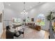 Spacious living room with high ceilings, arched windows, and modern decor at 807 Edmund St, Raleigh, NC 27604