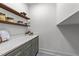 Walk-in pantry with custom cabinets and marble countertops and lots of storage at 807 Edmund St, Raleigh, NC 27604