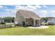 Spacious backyard featuring a fenced lawn and patio at 85 Twelve Oaks Dr, Willow Springs, NC 27592