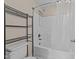 Full bath with a shower and shelving at 85 Twelve Oaks Dr, Willow Springs, NC 27592