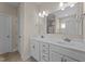 Bathroom featuring double sinks, a large mirror, and ample counter space at 85 Twelve Oaks Dr, Willow Springs, NC 27592