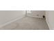 Neutral bedroom, carpeted, and a window letting in ample natural light at 85 Twelve Oaks Dr, Willow Springs, NC 27592