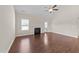 Inviting living room boasts a cozy fireplace and lots of natural light at 85 Twelve Oaks Dr, Willow Springs, NC 27592