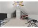 Spacious bonus room with ceiling fan and natural light at 9 Piney Grove Rd, Bahama, NC 27503