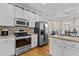 Well-equipped kitchen with stainless steel appliances and a breakfast area at 9 Piney Grove Rd, Bahama, NC 27503