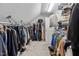 Spacious walk-in closet with clothing racks, shelving, and ample storage space at 9 Piney Grove Rd, Bahama, NC 27503