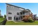 This home features a well maintained backyard, trampoline, and a large screened in porch with stairs at 908 Woodland Grove Way, Wake Forest, NC 27587
