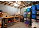 Unfinished basement storage area with shelving, concrete floor, and ample space at 908 Woodland Grove Way, Wake Forest, NC 27587