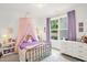 Charming bedroom with a canopy bed, a window, and a dresser, perfect for a  at 908 Woodland Grove Way, Wake Forest, NC 27587