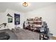 Bright office featuring stylish decor, carpeted floor, and built-in shelving at 908 Woodland Grove Way, Wake Forest, NC 27587