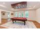 Game room featuring a pool table, a decorative rug, and a coffered ceiling with lighting at 102 Bosswood Ct, Cary, NC 27518
