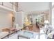 Bright living room with hardwood floors, neutral paint, and staircase at 102 Bosswood Ct, Cary, NC 27518