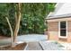 Private basketball court adjacent to the home's exterior, perfect for recreation at 105 Woodsage Way, Cary, NC 27518