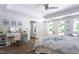 Bright bedroom features a vanity, natural light, and hardwood floors at 105 Woodsage Way, Cary, NC 27518