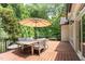 Outdoor deck space with table and chairs for outdoor enjoyment at 105 Woodsage Way, Cary, NC 27518
