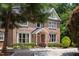 Charming brick home with manicured landscaping, traditional windows, and inviting entryway at 105 Woodsage Way, Cary, NC 27518