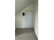 Cozy bedroom featuring plush carpet and a white door, creating a peaceful and inviting atmosphere at 106 Viola Ln, Franklinton, NC 27525