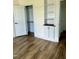 Bedroom features an open closet space and a built-in bookcase at 106 Viola Ln, Franklinton, NC 27525
