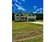 Charming one-story home featuring a two-car garage and a covered front porch at 106 Viola Ln, Franklinton, NC 27525