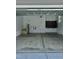 Spacious garage with painted walls, EV charger, storage cabinets and access to inside the home at 106 Viola Ln, Franklinton, NC 27525