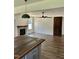 View of living room with fireplace and wood door at 106 Viola Ln, Franklinton, NC 27525