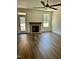 Spacious living room features wood floors and fireplace at 106 Viola Ln, Franklinton, NC 27525
