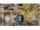 Top-down aerial shot of a residence with a yard, car, and other structures visible at 112 Edgewood Dr, Roxboro, NC 27573