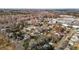 Aerial view reveals a large neighborhood on the outskirts of town, surrounded by natural beauty at 112 Edgewood Dr, Roxboro, NC 27573