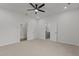 A spacious bedroom features new carpet, recessed lighting, and neutral paint at 112 Edgewood Dr, Roxboro, NC 27573