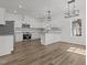 Bright, white kitchen with stainless steel appliances, and an efficient layout at 112 Edgewood Dr, Roxboro, NC 27573