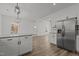 Modern kitchen with granite countertops, stainless steel appliances, and an open layout at 112 Edgewood Dr, Roxboro, NC 27573