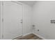 A mud room features plank flooring, and a white door at 112 Edgewood Dr, Roxboro, NC 27573